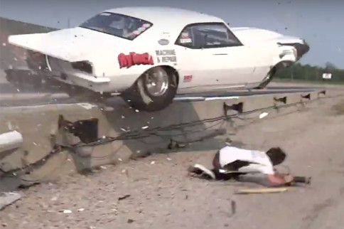 Video: Car Launches Over Wall, Nearly Crushes Photographer