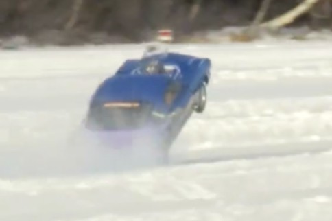 Video: Ice Drag Racer Pulls Power Wheelstand At 130 MPH!